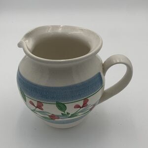 pottery pitcher hand painted 6" high 7"w